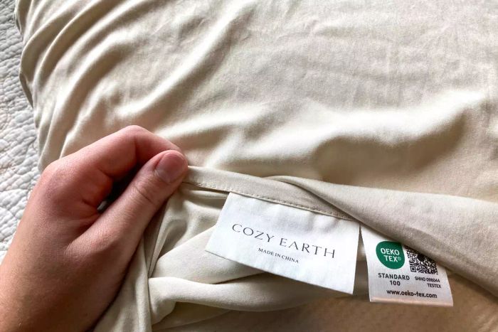 A detailed closeup of the tags and hem on the Cozy Earth Bamboo Pillowcase
