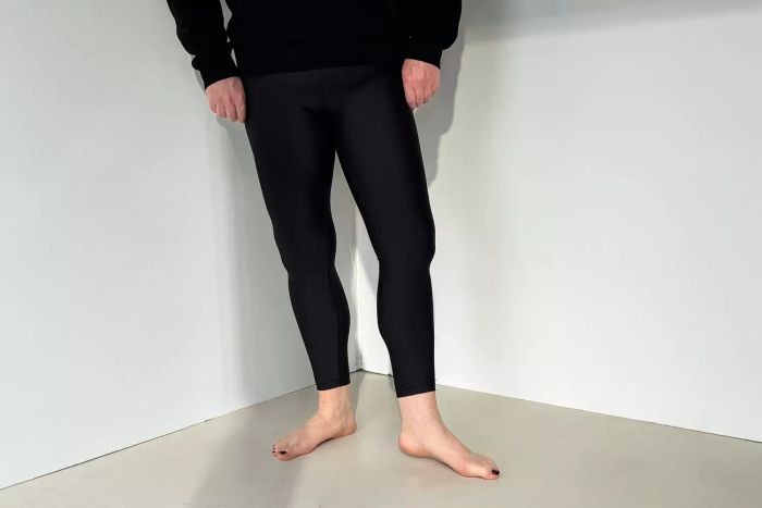 An individual models the Athleta Interval Tight