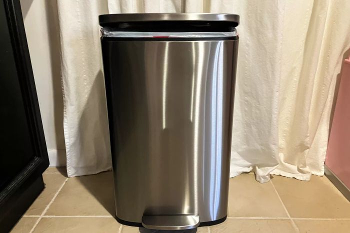The front view of the Amazon Basics 13.2 Gallon Soft-Close Trash Can with Foot Pedal