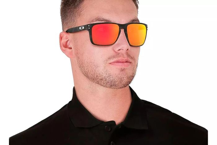 A person wearing Oakley Holbrook XL Sunglasses