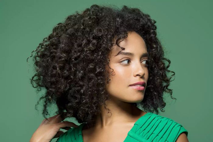 curly-haired woman