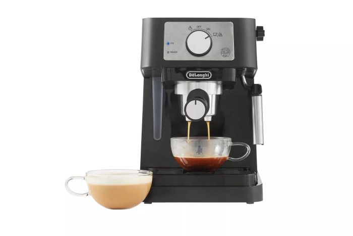 De'Longhi Stilosa Espresso Machine filling a cup with freshly brewed coffee.