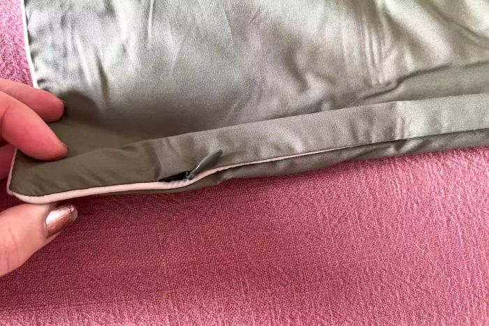 A closeup view of the corner zipper on the Brooklinen Classic Percale Pillowcases