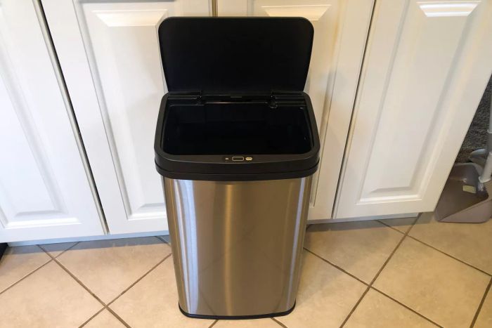 The NINESTARS DZT-50-28 13 Gallon Touchless Motion Sensor Trash Can with its lid open