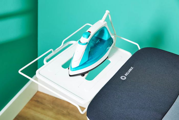 An iron placed on the Reliable Home Ironing Board