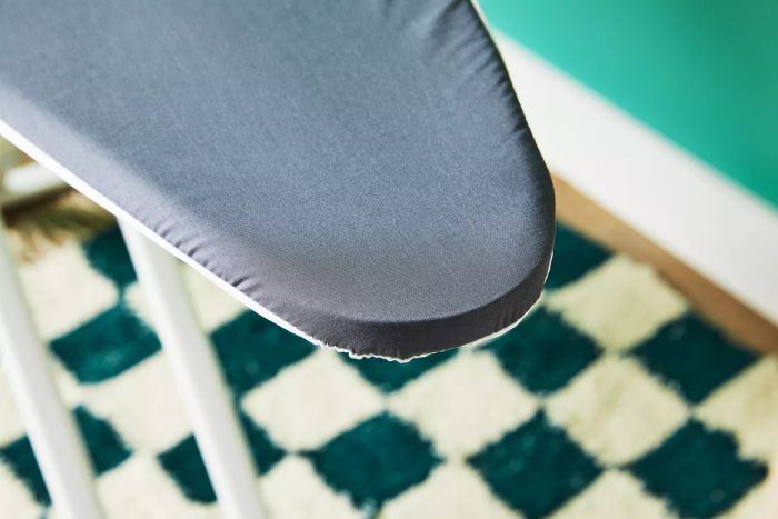 A close-up view of the edge of the Reliable Home Ironing Board