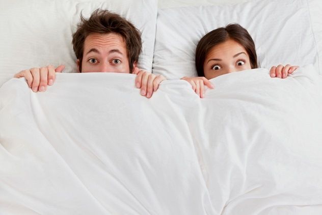 Funny couple in bed