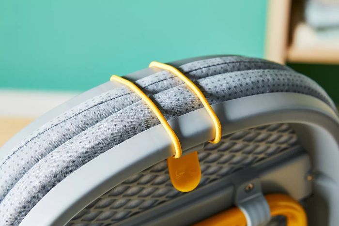 A close-up view of the folded edge of the Joseph Joseph Pocket Plus Folding Ironing Board