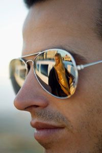 Close-up of a person wearing sunglasses.