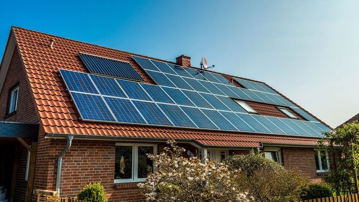 Solar panels installed on the roof of a house.