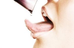 A person on the brink of drinking water