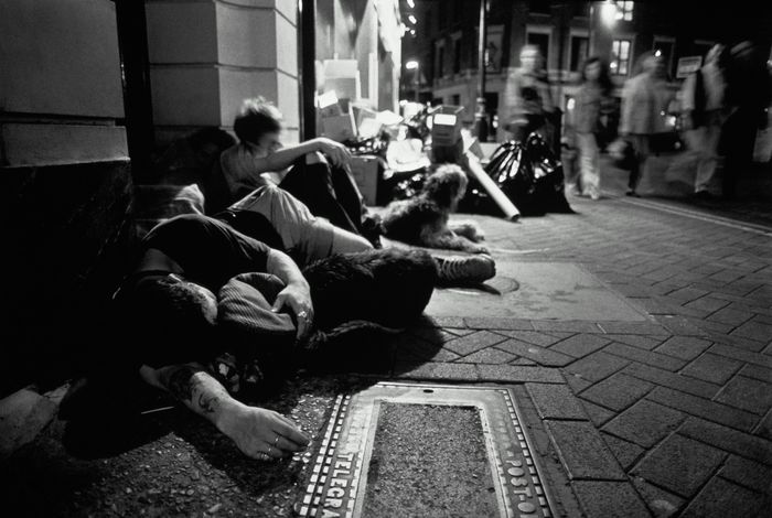 Homeless individuals on the streets of London.