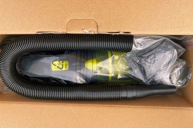 The AUTO JOE 12-Volt Corded Car Handheld Vacuum Cleaner with Interior Auto Detailing Accessory Kit Model ATJ-V501 in its packaging