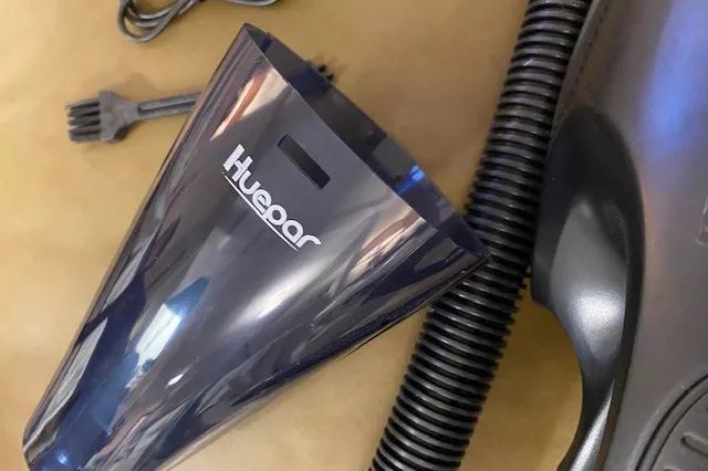 A detailed view of the components of the Huepar Car Vacuum, 13000PA Cordless Portable Car Vacuum Cleaner