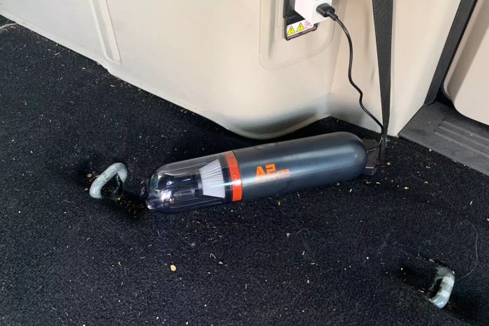 The Baseus A2 Pro Car Vacuum Cleaner during the charging process