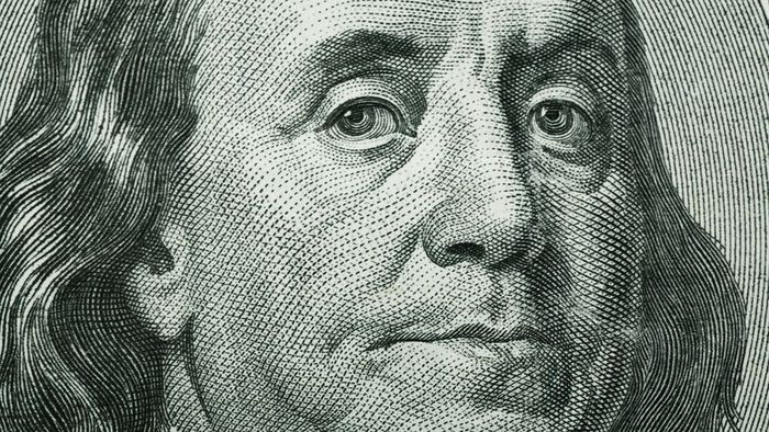 Close-up image of Benjamin Franklin featured on the One Hundred Dollar Bill