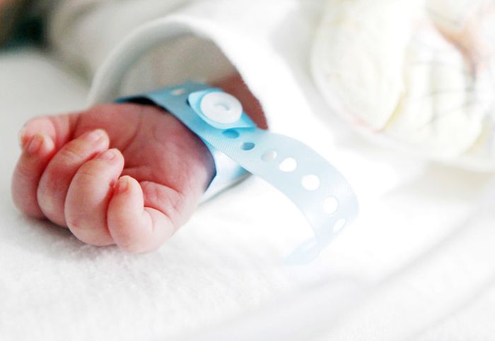A newborn baby's hand