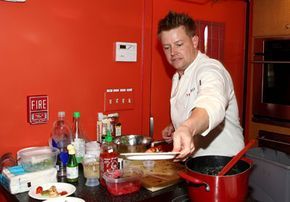 A chef preparing a dish on the TV show 