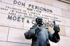 A statue of Dom Perignon stands proudly outside the Moet and Chandon winery in France.