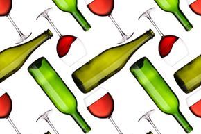A seamless pattern of bottles and glasses