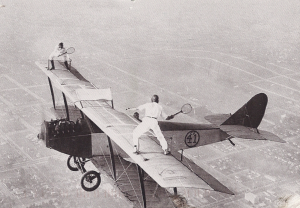 Wing walking is the extreme sport where a person performs acrobatic feats on the wings of an airborne aircraft. This daring activity has captured the imaginations of many, as participants often stand or even perform stunts while the plane soars through the sky, making it one of the most thrilling aerial spectacles.