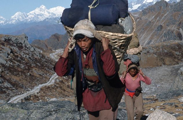 Climbers who reach the summit of Mt. Everest typically owe their success to the guidance of a local Sherpa. Remarkably, Sherpas often journey ahead of the climbers to set up ropes and ladders, ensuring the others can scale the treacherous cliffs with a better chance of success.