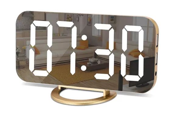 The Amazon SZELAM Digital Alarm Clock features a LED and mirror display with a large screen. It includes dual USB charging ports, three brightness levels, and offers both 12 and 24-hour formats. A modern, sleek clock ideal for bedrooms, living rooms, or offices – available in Gold.