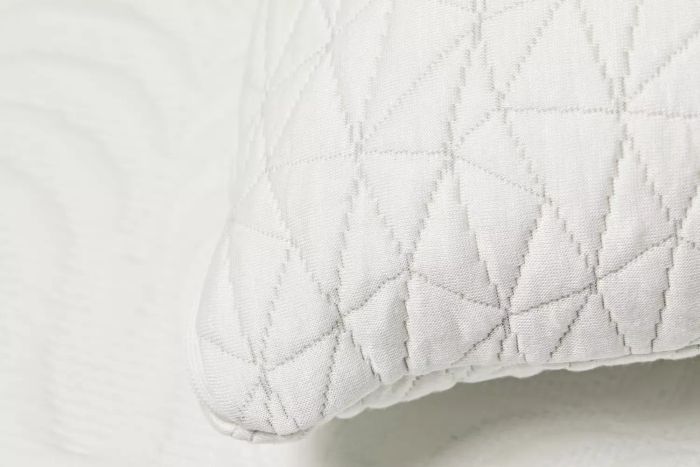 A close-up view of the corner of the Coop Sleep Goods The Original Pillow