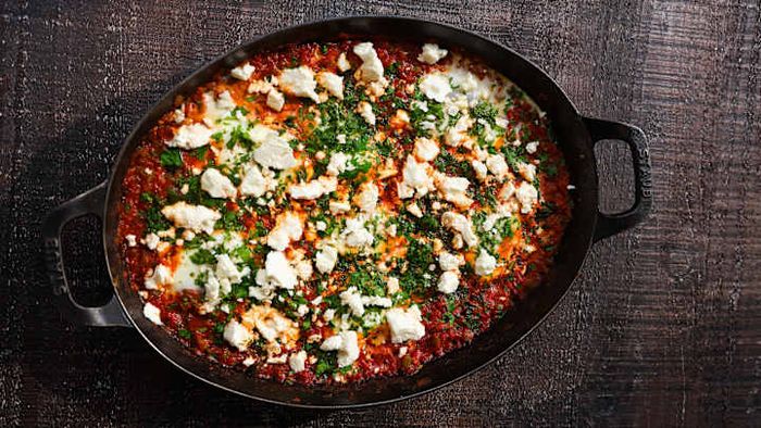 It offers a delightful combination of cheese, tomatoes, and eggs.