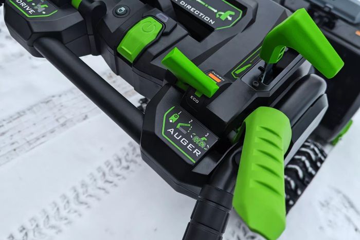 A detailed look at the controls on the EGO Power+ 24-Inch Cordless 2-Stage Snow Blower.