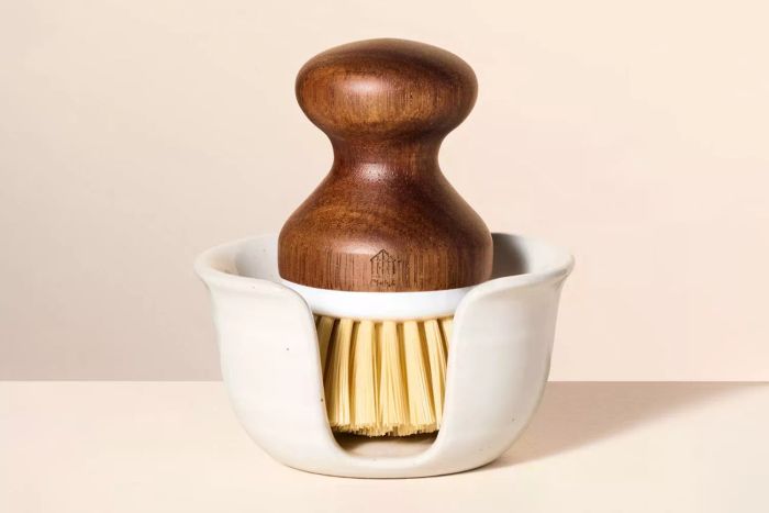 The Target Hearth & Hand with Magnolia Glazed Stoneware Sink Caddy & Nylon Scrub Brush provides both style and function, keeping your sink area neat while offering a high-quality scrub brush for cleaning.