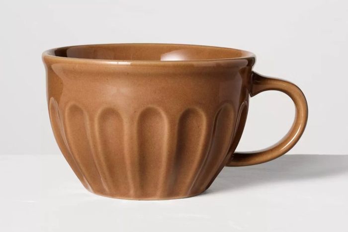 The Target Hearth & Hand with Magnolia 15oz Fluted Stoneware Latte Mug combines elegant fluted stoneware with a comfortable size, making it ideal for sipping lattes or other hot drinks.