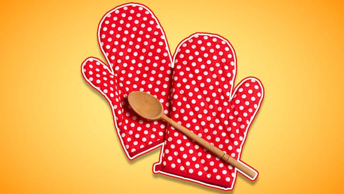 It's important to ensure your oven mitts are completely dry before removing anything from the oven.