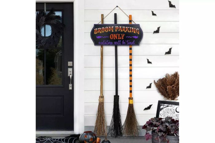 sign outdoor with witches brooms
