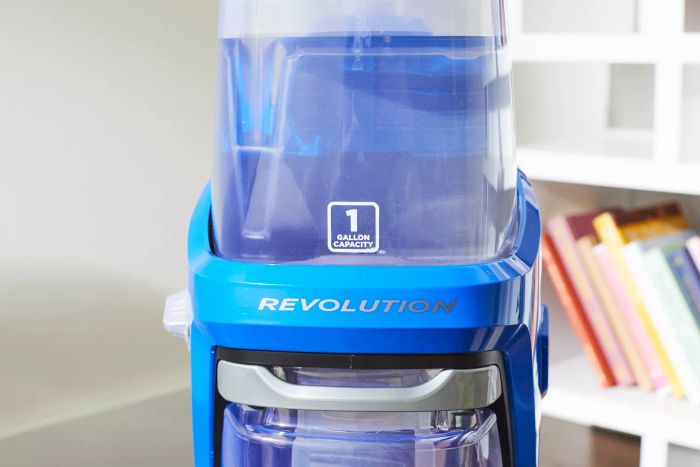 A detailed shot of the liquid container on a Bissell ProHeat 2X Revolution Pet Carpet Cleaner 35799