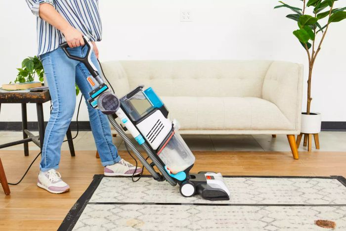 A user tests the Shark CarpetXpert with Stainstrike Upright Deep Carpet Cleaner