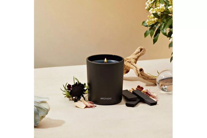 A lit Apotheke Charcoal Candle