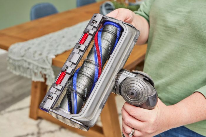 Two hands displaying the underside of the Dyson Gen5detect Cordless HEPA Vacuum