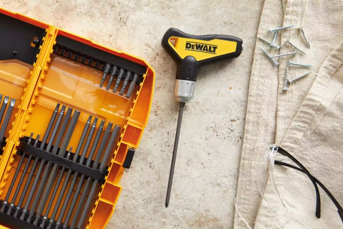 DeWalt Ratcheting 31-Piece T-Handle Set displayed open on a beige surface beside a cloth