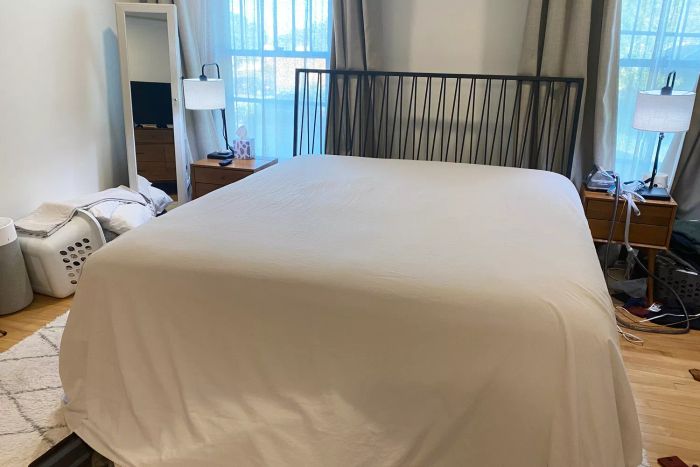 Bed adorned with the Lands’ End Comfy Super Soft Cotton Flannel Sheet Set