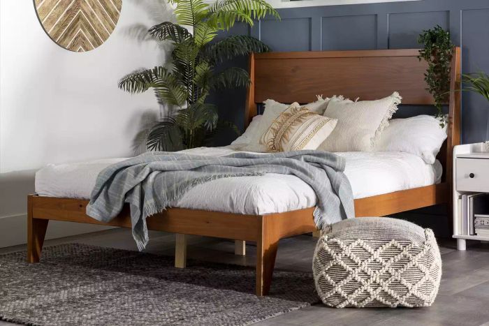 A bedroom setup featuring Walmart Furniture
