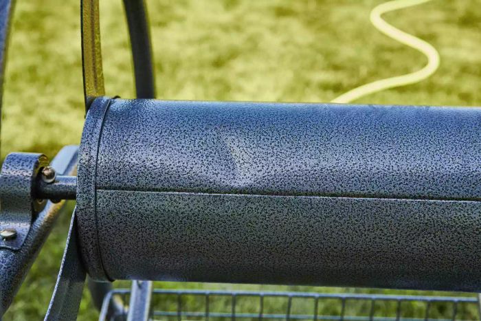 Close-up of the hose rolling mechanism on the GroundWork Hose Reel Cart
