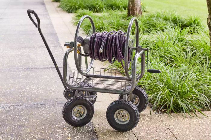 GroundWork Hose Reel Cart positioned on a garden floor near grass