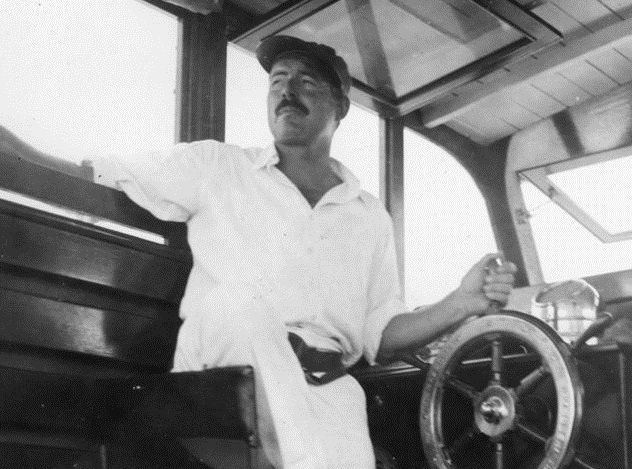 747px-Ernest_Hemingway_and_Carlos_Gutierrez_aboard_Pilar,_Key_West,_1934