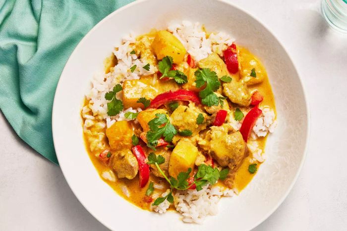 Creamy Mango Chicken Curry Served with Fragrant Coconut Rice