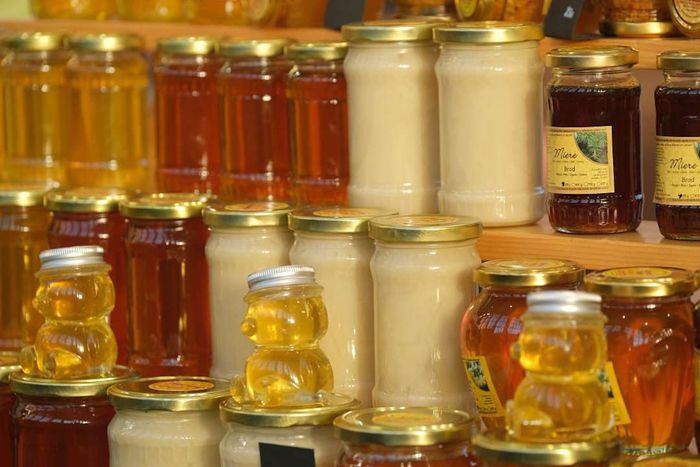 Jars of honey available for purchase.