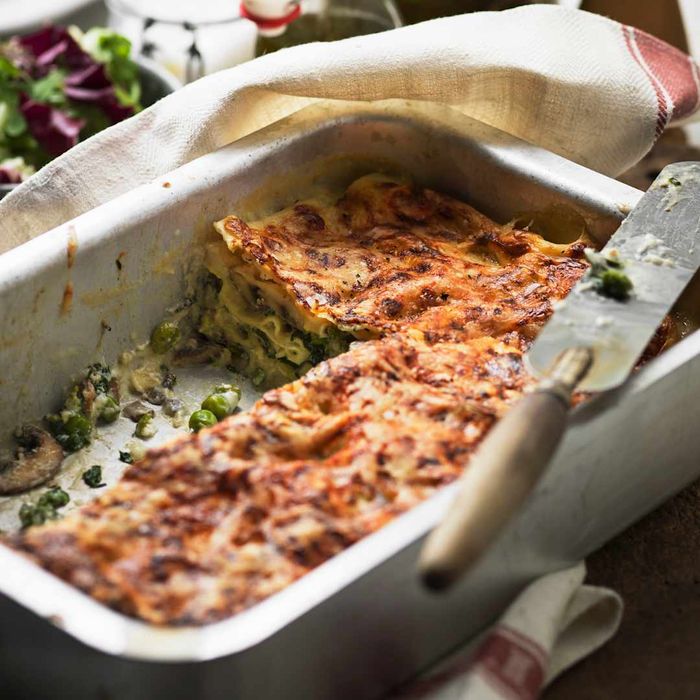 A pan of vegetable lasagna, ready to be served.