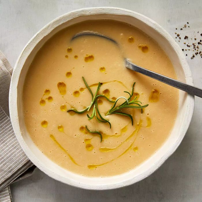 In this Creamy Miso White Bean Soup recipe, miso enhances the smooth base, complementing fresh rosemary, enriching the butter, and adding a savory depth to the cannellini beans.