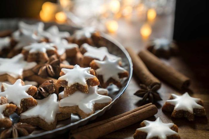 German zimtsterne cookies featuring star anise and cinnamon sticks.