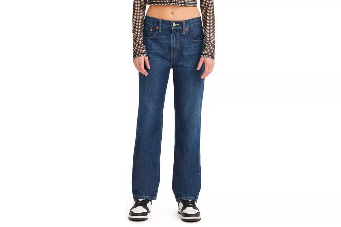 A person wearing Levi’s jeans